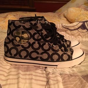 Coach high top sneakers.